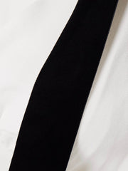 Velvet bow embellished white gown